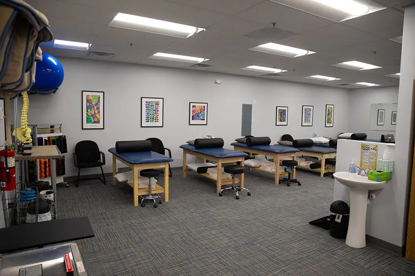 Row of treatment tables in the Dickson Physical Therapy clinic