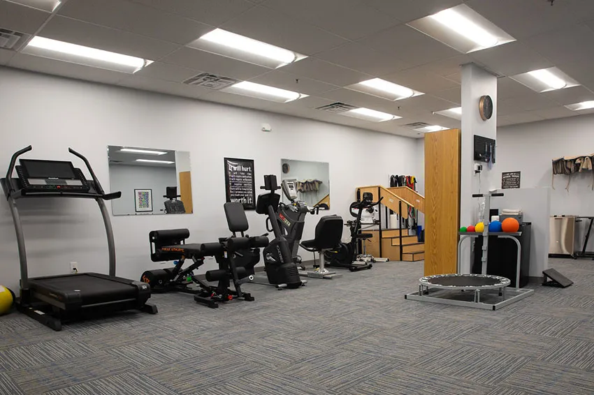 Rehabilitation gym with treadmill and exercise machines