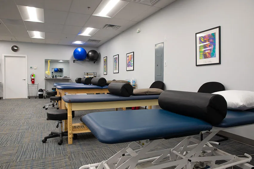 Treatment tables with bolsters and therapy balls